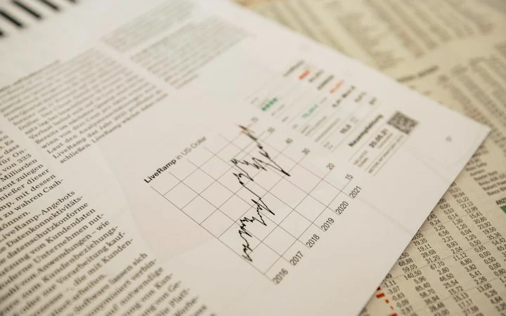 Printed financial statements on a desk